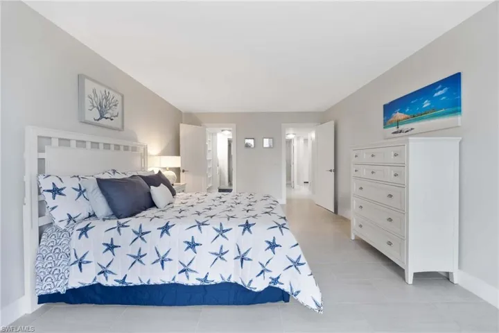 Bedroom featuring light tile patterned flooring