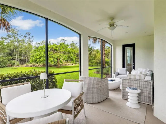 Sunroom featuring ceiling fan and an outdoor hangout area