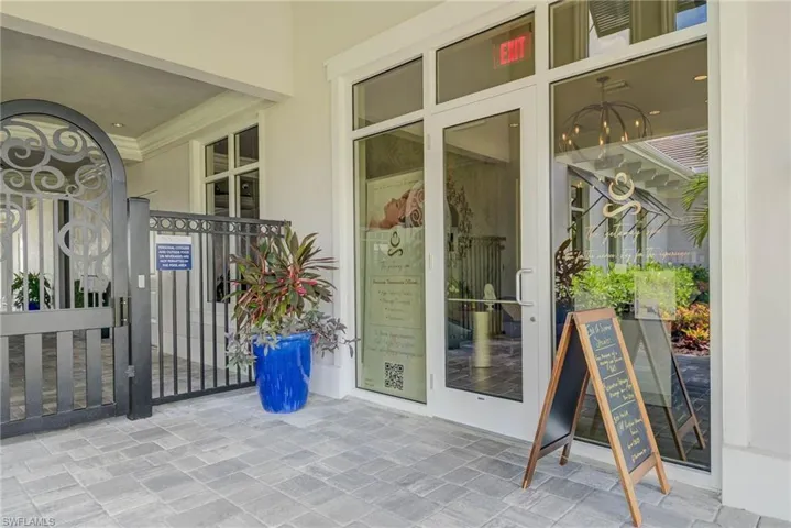 Gated Entrance leads to Fitness Center, "The Hammock" Bar & Casual Dining and Pool Area -- Also Entrance to Salon