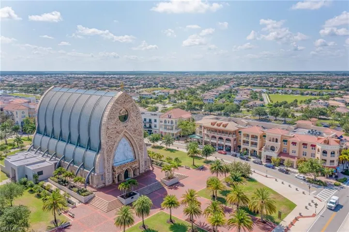 Aerial view - shopping galore downtown with variety of different restaurants, professional service and even our own Publix~