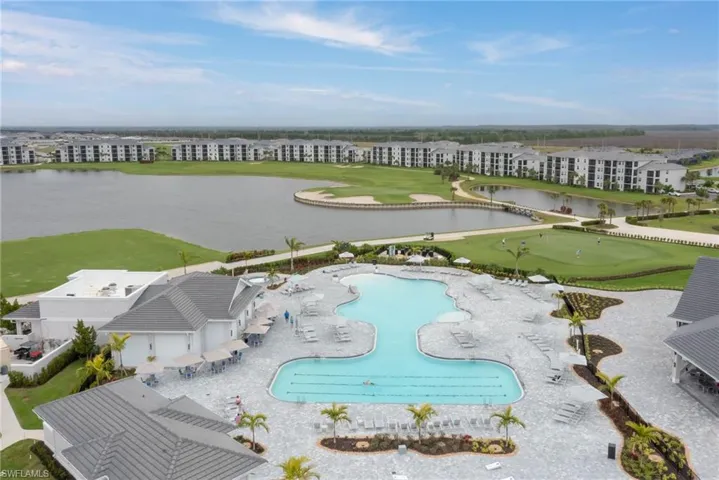 Bird's eye view of The Terraces Condos, lake amd golf course from pool area