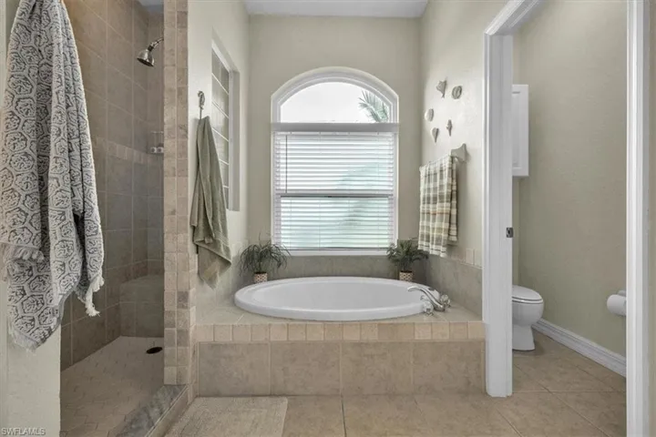 Garden Tub and large walk in shower.