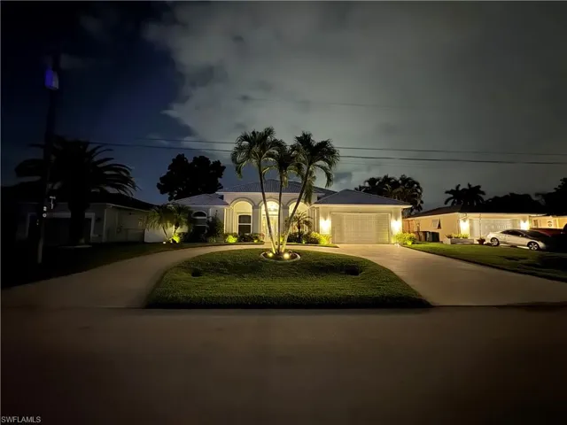 Nighttime Photo of Front of House .