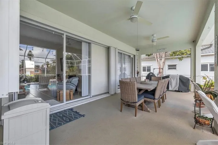 Swimming pool with  a patio.