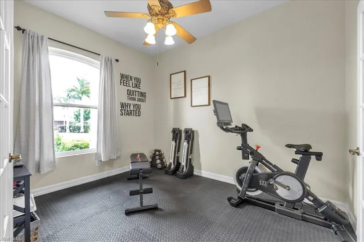 Currently used as an exercise room, however it could be an office. It has French doors.