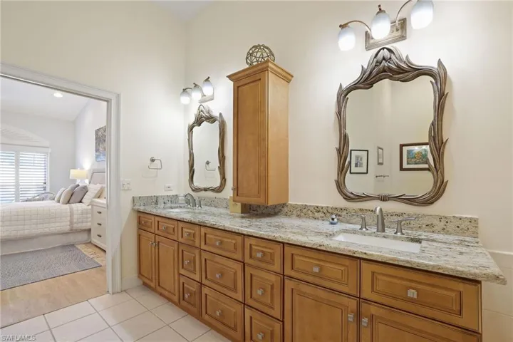 Bathroom with vanity and tile patterned floors