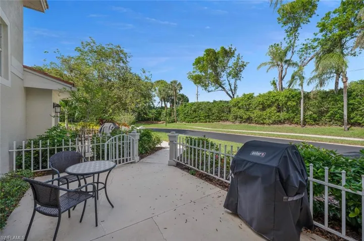 View of private courtyard patio with area for grilling