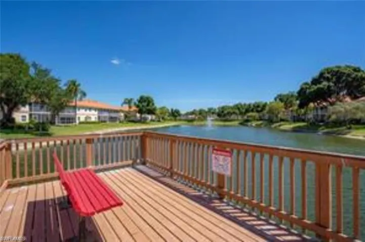Wooden deck/ Fishing Pier featuring a water view