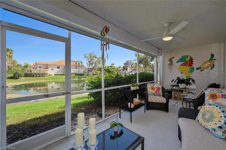 XL Screened Lanai featuring water view and ceiling fan