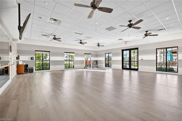 Workout area with a paneled ceiling