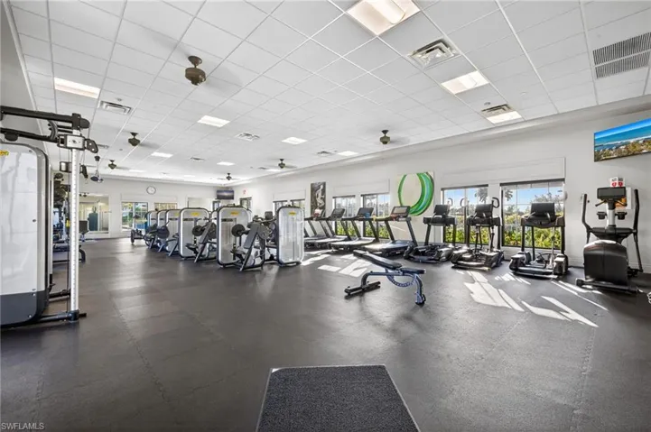 Workout area with a paneled ceiling