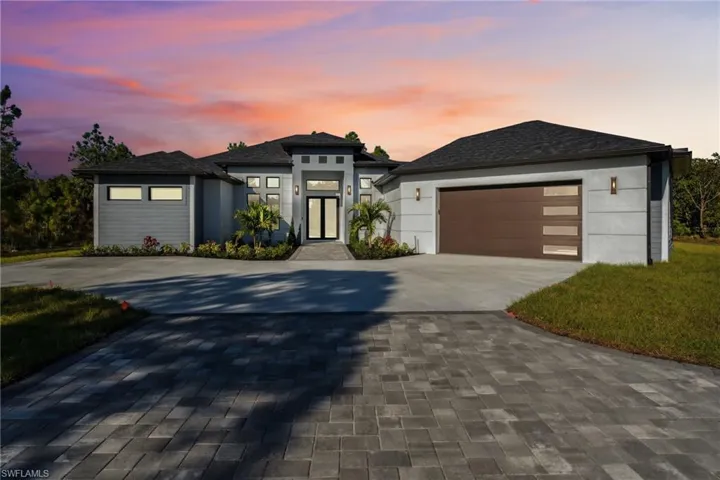 Prairie-style home with a garage