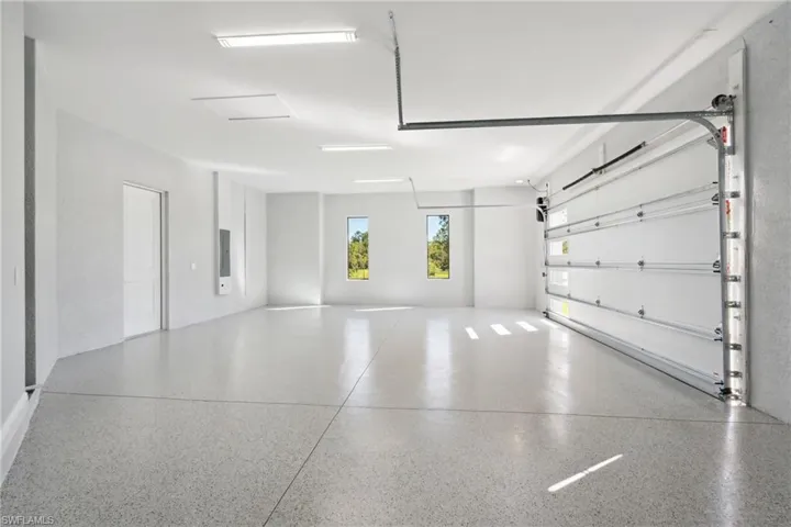 Garage featuring electric panel