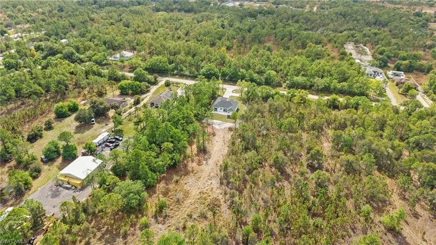 Drone / aerial view of a heavily wooded area