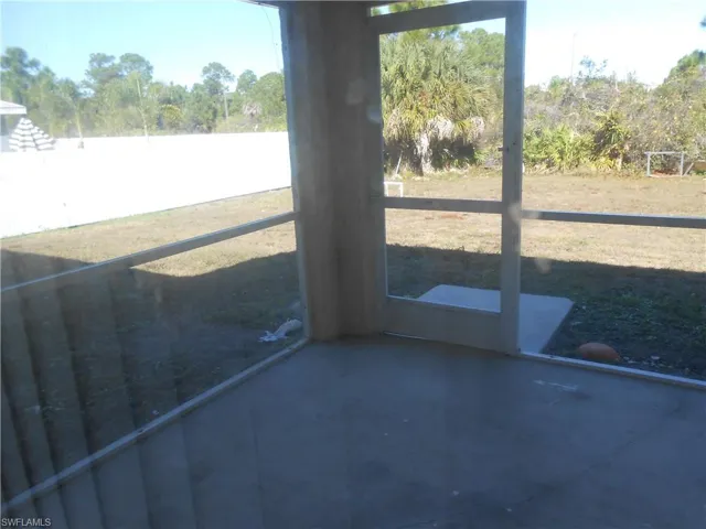Unfurnished sunroom featuring healthy amount of natural light