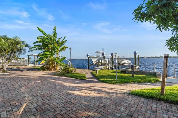The dock is beside a concrete fishing platform perfect for jet ski and kayak launching
