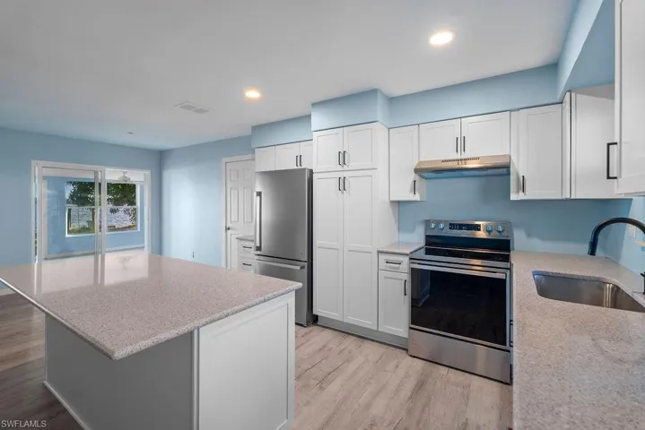 Island has additional counter top for seating