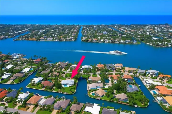 Aerial view of residential area with a large body of water