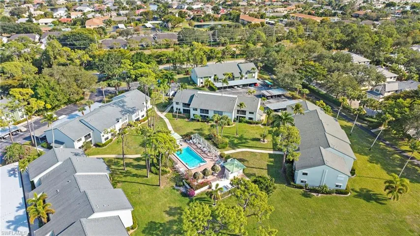 Aerial view of property and surrounding and a pool area