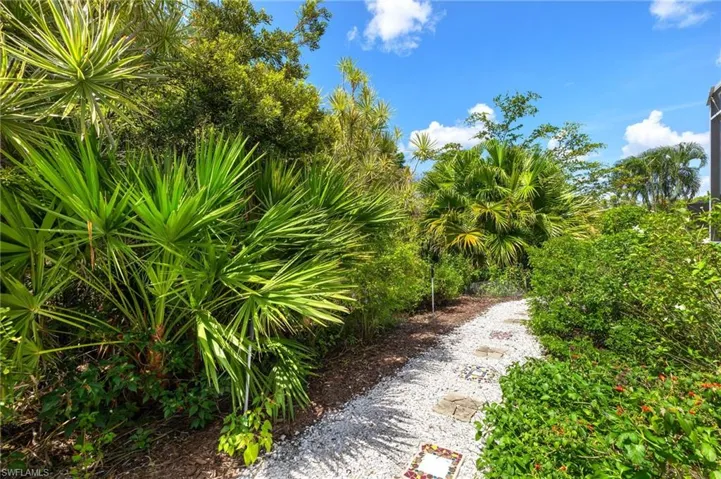 Enjoy the private butterfly garden path between home and preserve