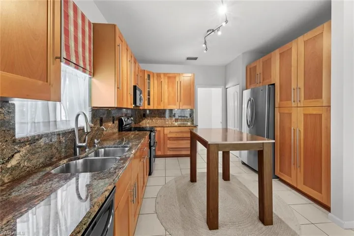 Wall pantries on both sides of refrigerator