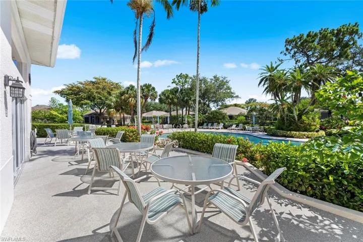 Seating area overlooking pool