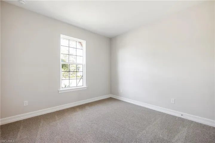 Empty room featuring carpet