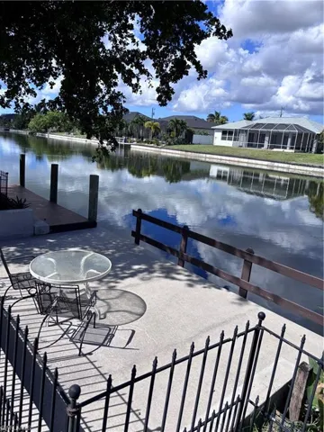 Dock featuring a water view