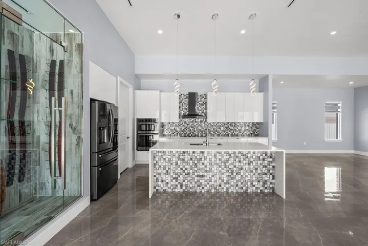 Kitchen with climatized wine room