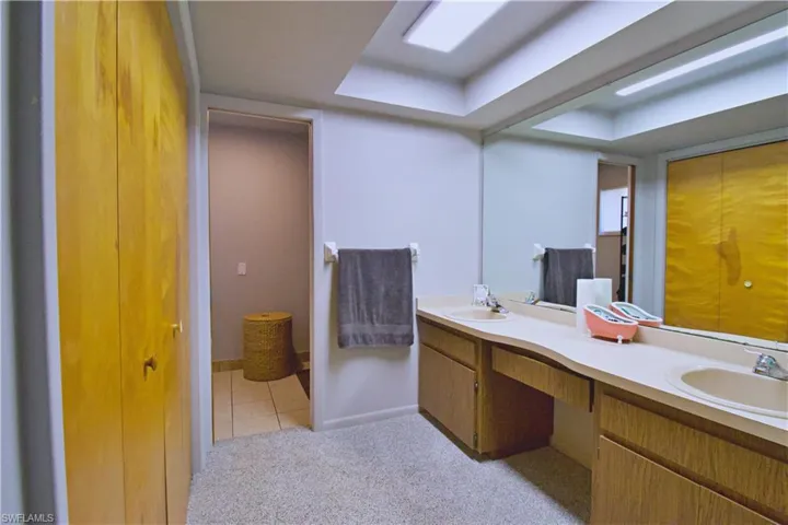 Bathroom featuring vanity and tile patterned floors