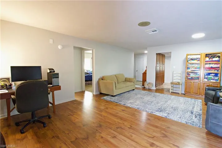 Office space featuring hardwood / wood-style flooring