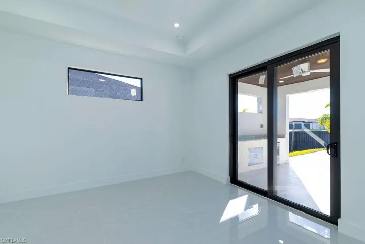 Spare room with tile patterned flooring and recessed lighting