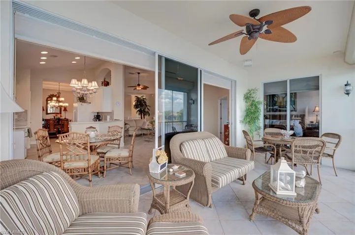 View of patio with outdoor lounge area and a ceiling fan