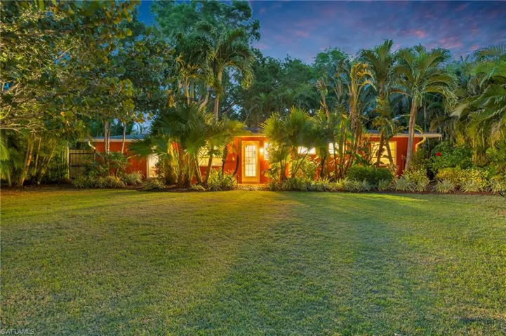 View of yard at dusk