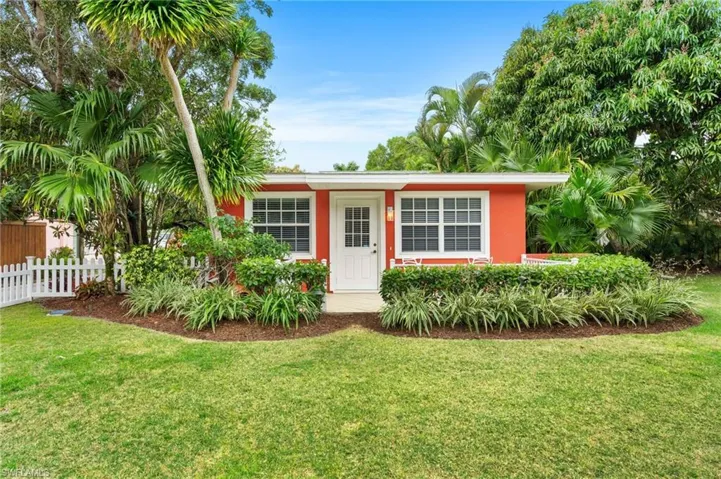 Single story home featuring a front yard