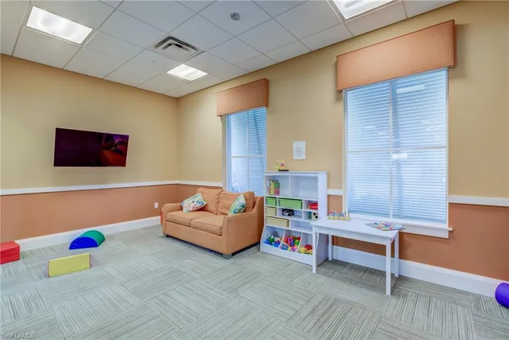 Recreation room with a drop ceiling