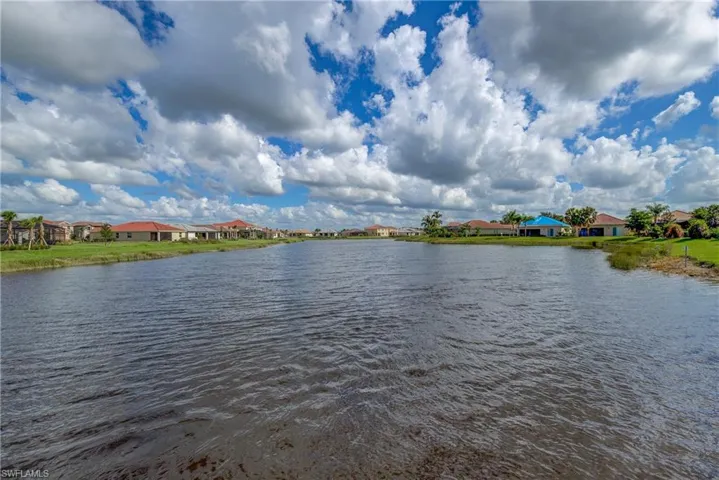 Water view featuring nearby suburban area