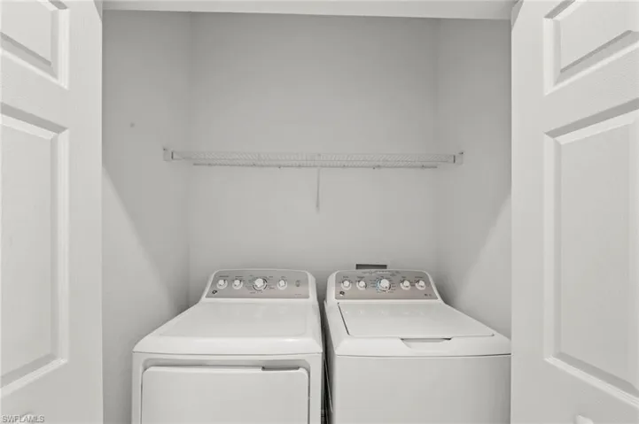 Laundry area with washing machine and dryer