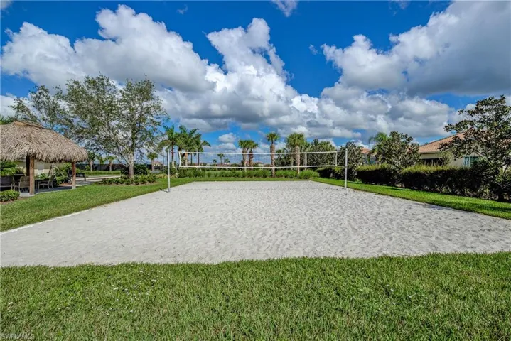 View of home's community featuring volleyball court, a gazebo, and a patio area