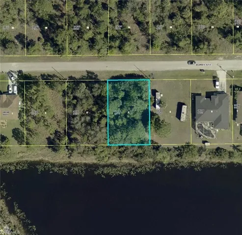 Aerial map of property and surrounding area with property boundaries highlighted