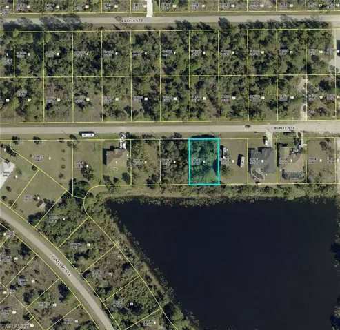 Aerial view of property's location featuring property parcel outlined