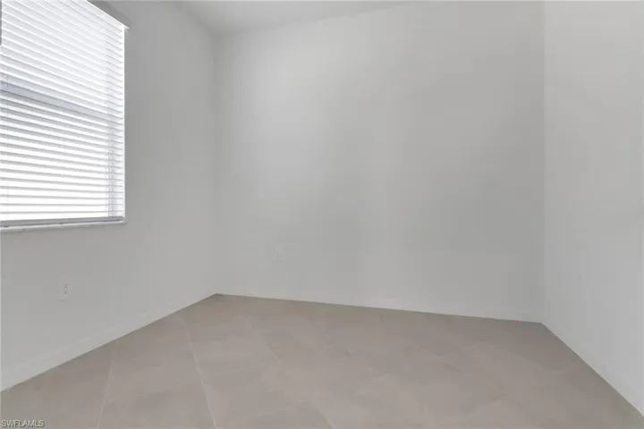 Spare room with baseboards