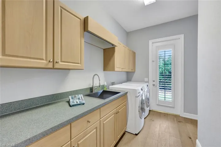 Utility Room w/ French Door to Side Yard
