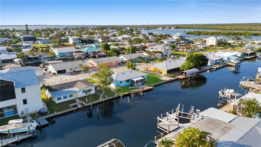 Aerial view of residential area with a large body of water