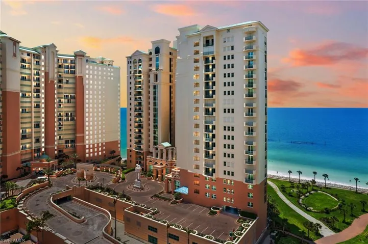 Outdoor building at dusk featuring a water view