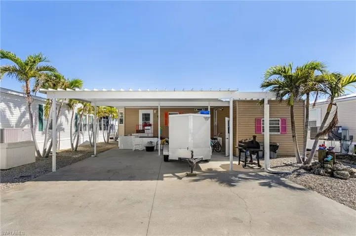 Plenty of parking with double carport and in the driveway