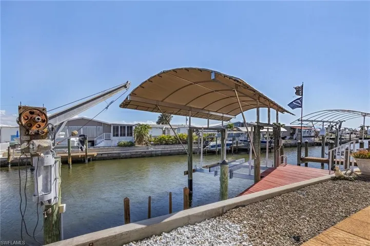 Dock and covered boat lift