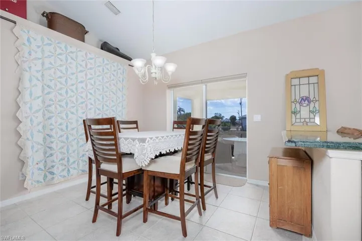 Dining room, featuring sliders to the lanai