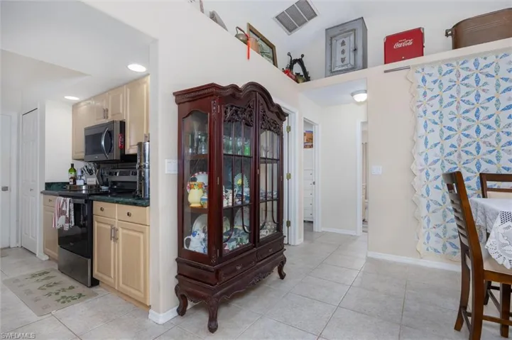 Kitchen flows right into separate dining room