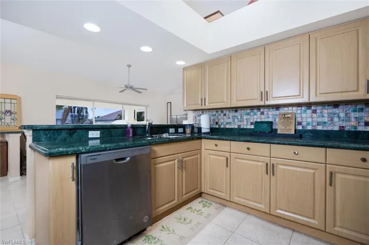 Kitchen has expansive counter space for meal prep